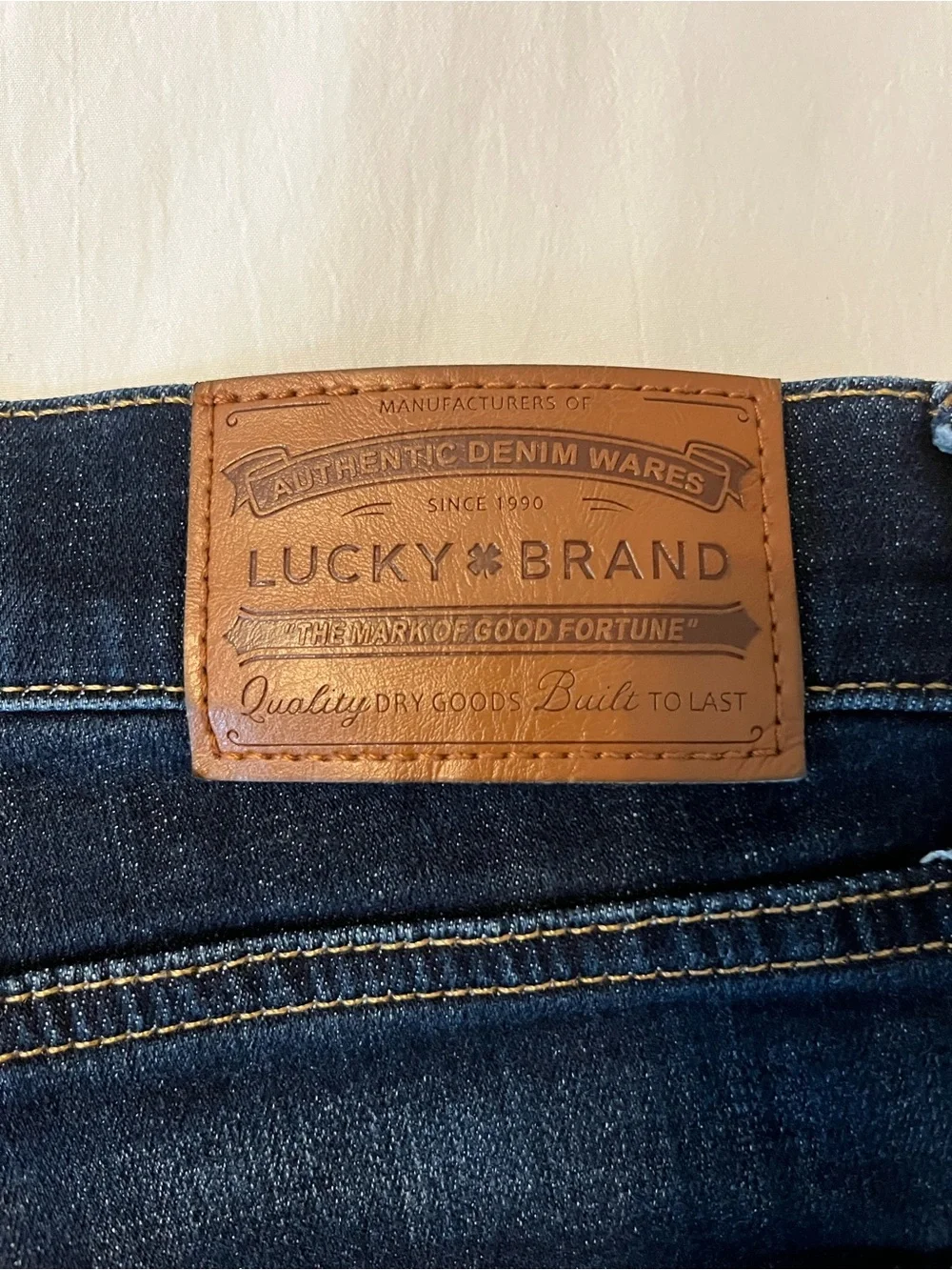Lucky Brand Men's Dark Blue Denim Jeans with Leather Logo Patch